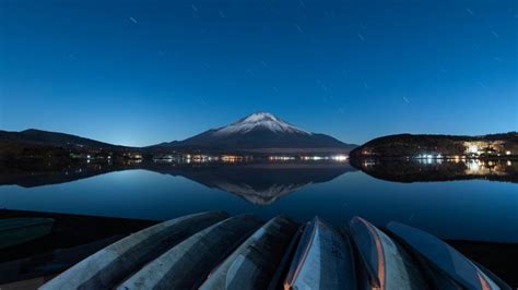 Night view of Mount Fuji from lake Yamanaka, Yamanashi Prefecture ...