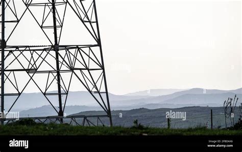 Silhouette of the metallic structure of a high-voltage electrical power ...