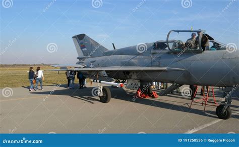 People Visit the Cockpit of a Combat Jet MiG 21 Military Aircrafts in ...