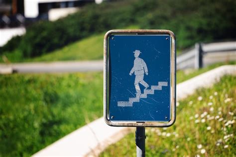 Premium Photo | Traffic sign pedestrian descending going down the stairs crosswalk symbol