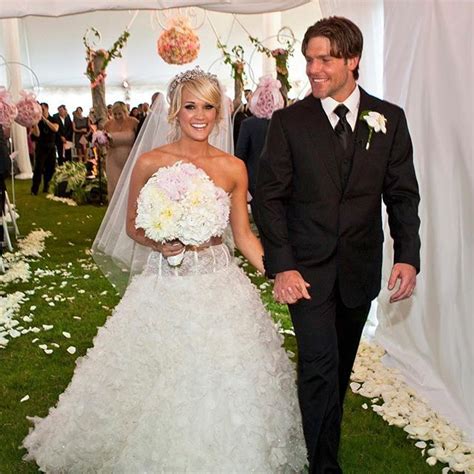 Carrie Underwood And Mike Fisher | Celebrity wedding photos, Carrie ...