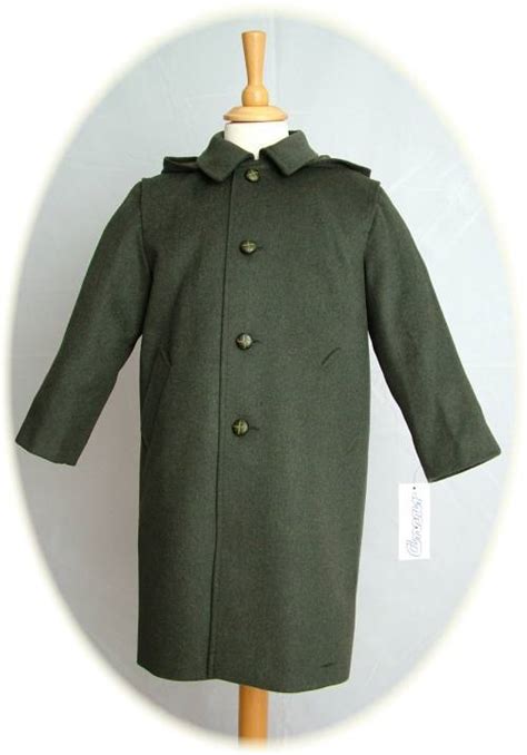 Child's green Loden coat. Available in sizes 6 years to 10 years.