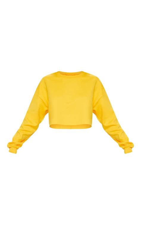 Yellow Ultimate Cropped Sweatshirt | Tops | PrettyLittleThing USA