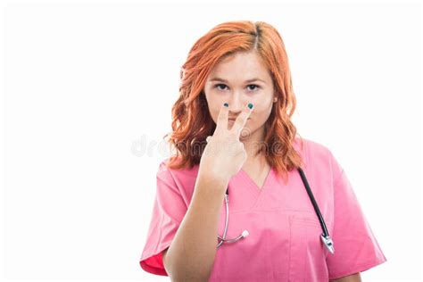 Young Female Doctor Showing Look into My Eyes Gesture Stock Image ...