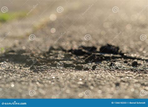 Road Damage with Broken Tar Stock Image - Image of grey, broken: 136618203