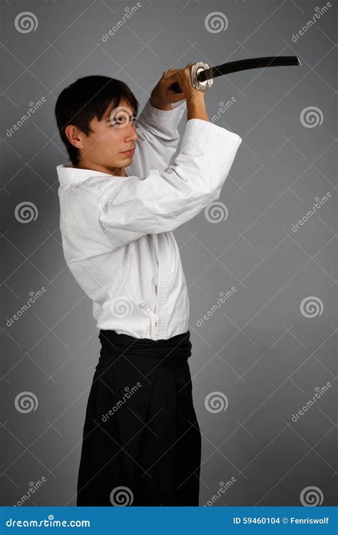 Man In Aikido Uniform With Katana Sword Stock Photography ...