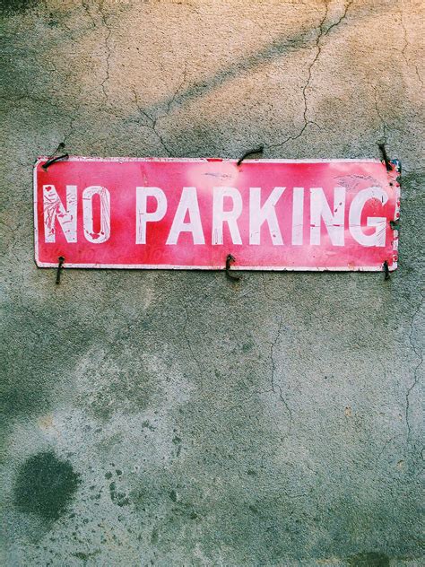 "An Old No Parking Signage." by Stocksy Contributor "Shikhar Bhattarai" - Stocksy