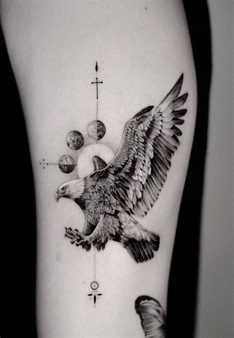 an eagle with the moon and stars on it's back leg is shown in black and ...