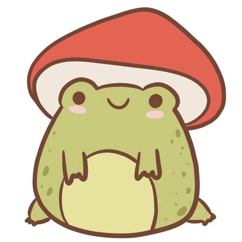 a green frog with a red hat sitting on the ground