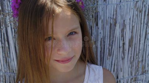 Portrait of Little Cute Girl with Pretty Eyes on the Background. 4K Stock Video - Video of touch ...