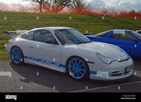 White Porsche 996 GT3 RS with Blue Detailing Stock Photo - Alamy