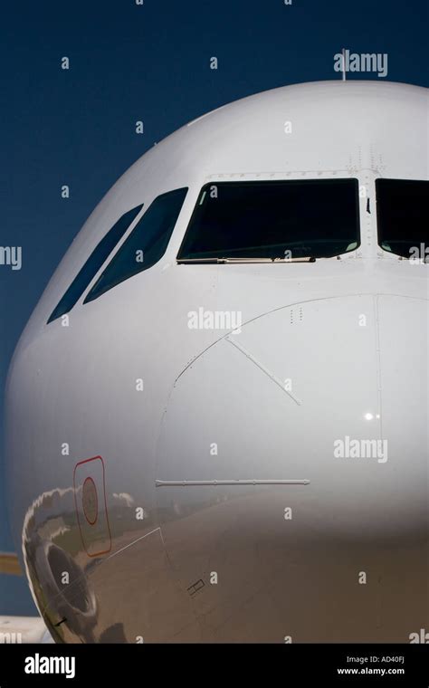 Frontal view of an Airbus A320. The starboard wing and engine nacelle ...