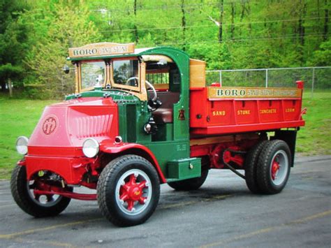 Mack bulldog with dump body and of course chain driven rear wheels. | Mack trucks, Dump trucks ...