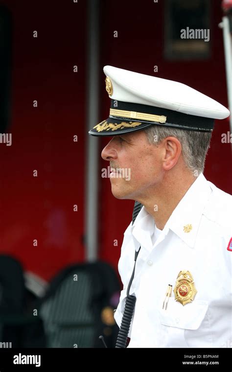 A Fire Chief in uniform Stock Photo - Alamy