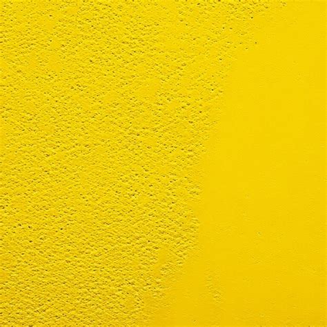 Premium Photo | Grunge rusty yellow old concrete cracked abstract texture studio wall background