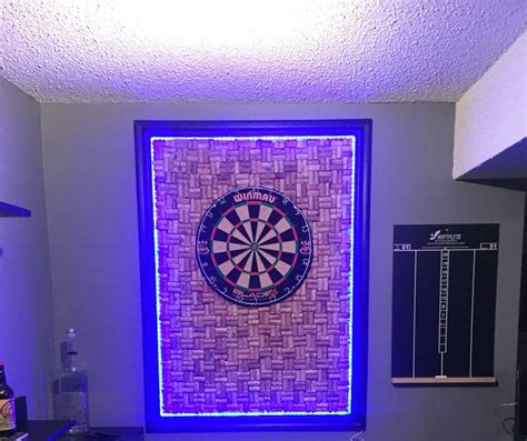 a dart board mounted to the side of a wall