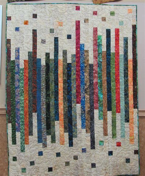 Strip quilt done with batik fabrics. | Quilts, Quilt patterns, Strip quilts