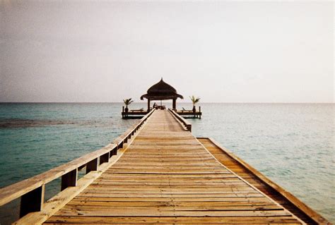 Free Images : sea, water, ocean, dock, sky, boardwalk, wood, morning ...