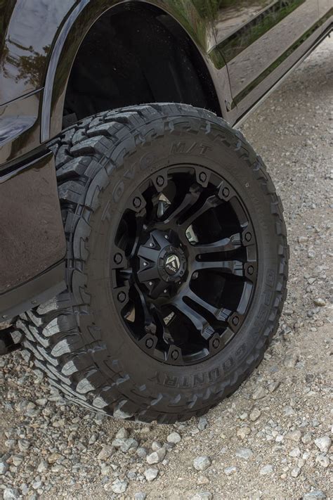 fuel vapor 20 inch wheels with 35 inch toyo m/t open country tires installed on this lifted 4x4 ...