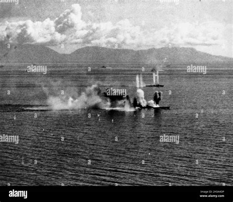 Japanese Battleship Musashi under attack by American carrier aircraft ...