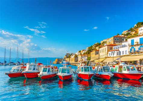 Greece - Hydra - traditional taxi boats in the port of Hydra island in ...