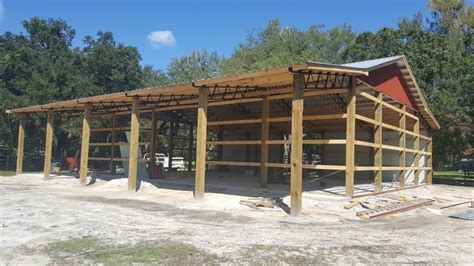 Steel Truss Pole Barns. Installation available in the Southeast. www.baileybarns.com | Steel ...