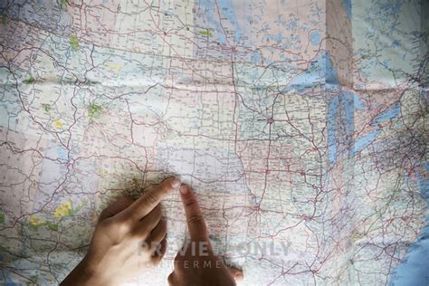 Finger Pointing To A Map - Stock Photos | Prixel Creative