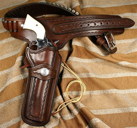 Typical western rig with simple border tooling tastefully done. Pistol Holster, Belt Holster ...