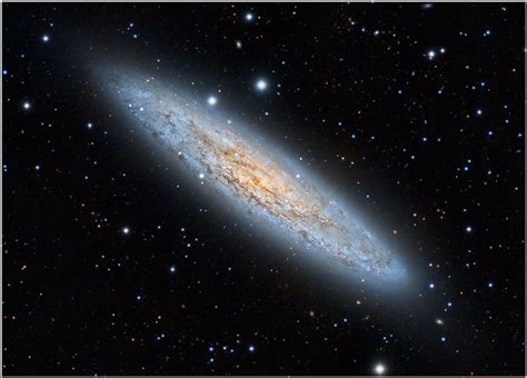 Discovered in 1783 by Caroline Herschel in the constellation of Sculptor, NGC 253 lies only ...