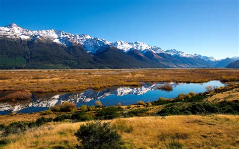 Serene River Reflection: A Stunning HD Wallpaper of Nature's Beauty