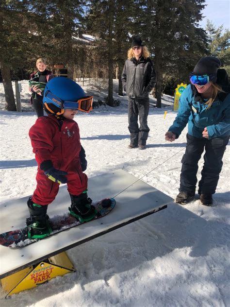 Sliding Sideways with Toddler Snowboard Lessons - All Mountain Mamas