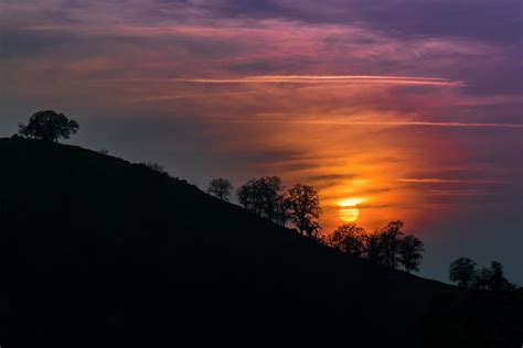 Hillside Sunset Photograph by Patti Deters - Fine Art America