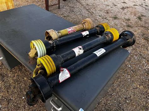 (4) PTO Tractor Shafts - Gavel Roads Online Auctions