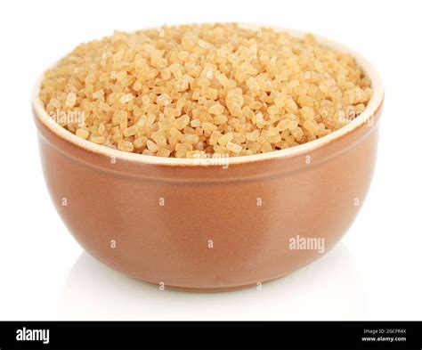 Brown sugar in bowl isolated on white Stock Photo - Alamy