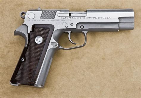 Colt experimental model SSP, 9mm double-action semiautomatic pistol, 14-round staggered magazine, st