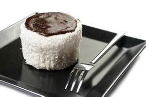 Donut with Powdered Sugar on the black square plate - Creative Commons ...