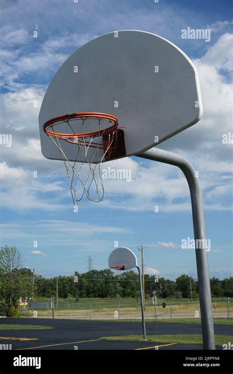 Basketball hoop at a grade school playground Stock Photo - Alamy