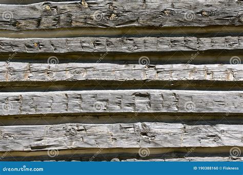 Hewn logs of an old cabin stock photo. Image of yesterday - 190388160