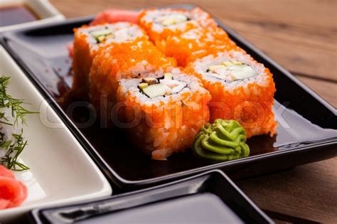 Maki Sushi set on wooden background | Stock image | Colourbox