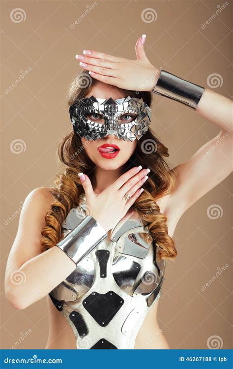 Futurism. Robotic Woman in Cosmic Mask and Metallic Stagy Costume Gesturing Stock Photo - Image ...