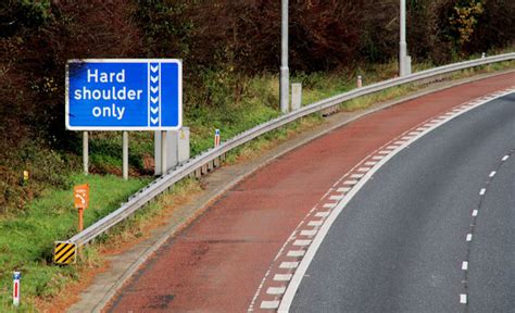 Motorway bus lane sign, Dunmurry © Albert Bridge :: Geograph Ireland