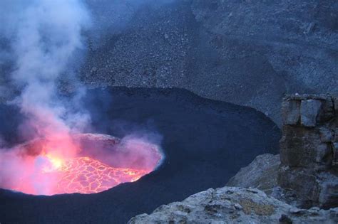 Lava lake in the pit crater of Nyiragongo eruption volcano, on June 22 ...