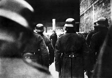 ww2inpictures: A German firing squad prepare to execute a French man accused of being a member ...