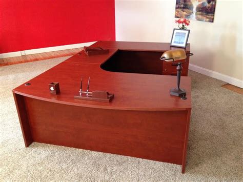 72” x 108” bowfront, curved corner U-shaped desk with locking box/box/file pedestal. Must ...