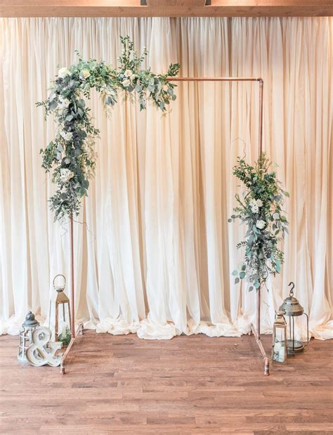 Minimalist wedding copper wedding arch arbor greenery wedding flowers eucalyptus greenery ...