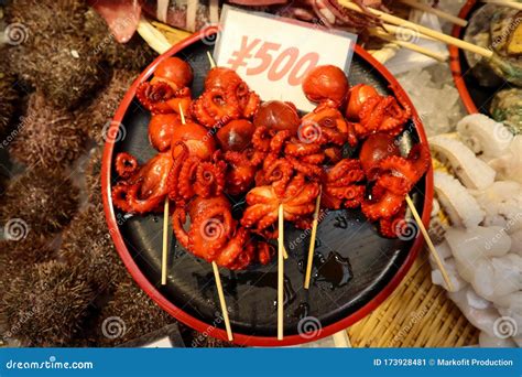 Fresh Japanese Octopus on the Plate As Street Food in Osaka Stock Image ...