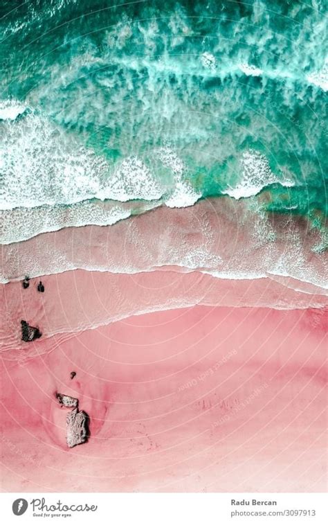 Aerial View Of Ocean Waves And Beautiful Pink Sandy Beach Shore - a ...