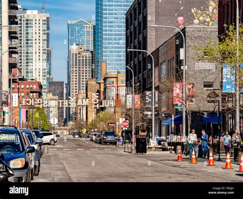 A view of the popular Fulton Market Street on a sunny afternoon. Main ...