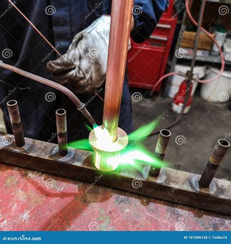 Soldering of Brass Fittings on Copper Pipe Stock Photo - Image of ...