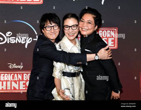 Ke Huy Quan, left, Michelle Yeoh and Echo Quan attend the premiere of the Disney+ original ...